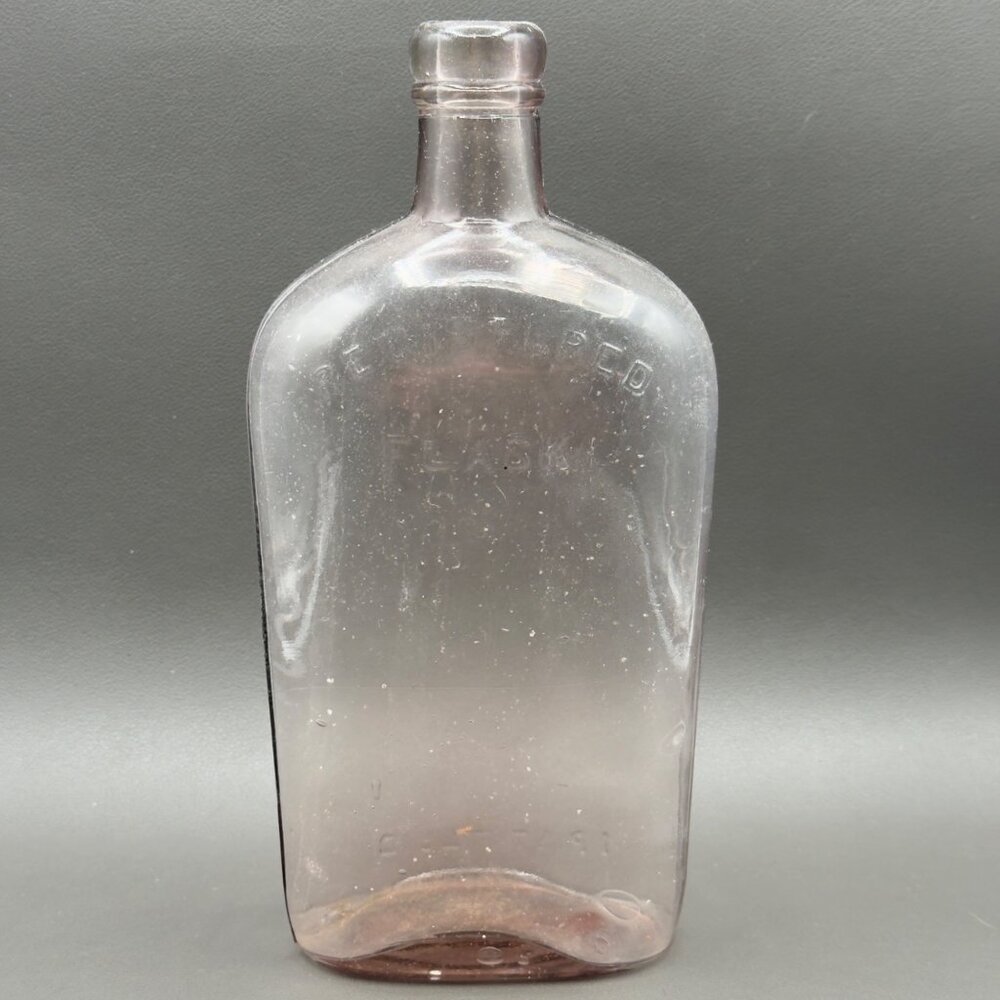 Vintage Warranted Flask Glass Bottle Light Purple Tan Tint Glows